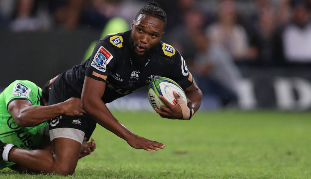 Lima Sopoaga of the Pulse Energy Highlanders tackling Lukhanyo Am of the Cell C Sharks during the Super Rugby match between Cell C Sharks and Highlanders at Jonsson Kings Park Stadium on May 05, 2018 in Durban, South Africa